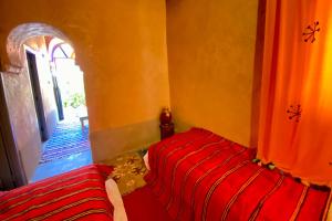 Letto o letti in una camera di Nomadic Birdway