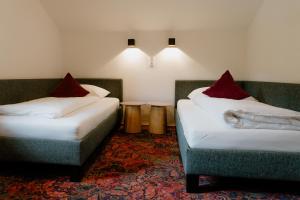 Posteľ alebo postele v izbe v ubytovaní Romantik Residenz (Ferienwohnungen Hotel Im Weissen Rössl) - Dependance