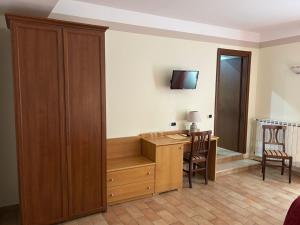 A television and/or entertainment centre at Locanda Fosca Umbra