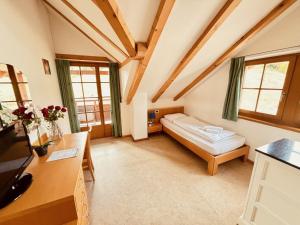 Ένα ή περισσότερα κρεβάτια σε δωμάτιο στο Hotel Corno Bianco