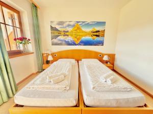 Ένα ή περισσότερα κρεβάτια σε δωμάτιο στο Hotel Corno Bianco