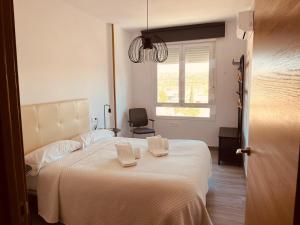 Postel nebo postele na pokoji v ubytování La Ermita
