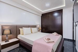 a hotel room with a bed with a towel on it at Luxury Copacabana in Costa de Adeje