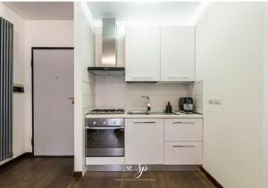 Η κουζίνα ή μικρή κουζίνα στο Appartamento Ponte Vecchio - M&M Holiday House