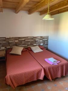 A bed or beds in a room at tranquilo y buena naturaleza