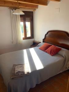 A bed or beds in a room at tranquilo y buena naturaleza