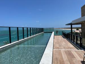 Swimmingpoolen hos eller tæt på Makadamia- Cantinho do mar Beira-mar em Porto de Galinhas