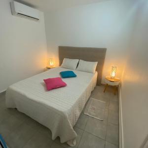 Ένα ή περισσότερα κρεβάτια σε δωμάτιο στο La maison du bonheur