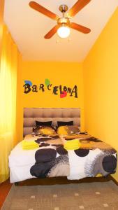 A bed or beds in a room at Carmen Seaview & Beach - Apartment