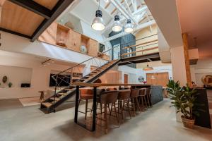 Η κουζίνα ή μικρή κουζίνα στο Chambre d'hôte dans un loft cosy en cœur de ville