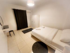 Postel nebo postele na pokoji v ubytování Stylish and modern apartment close to the airport