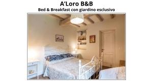 Postel nebo postele na pokoji v ubytování A'Loro B&B