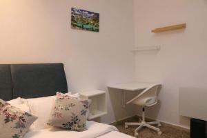 Postel nebo postele na pokoji v ubytování Jolie appartement à Ifrane calme et spacieux