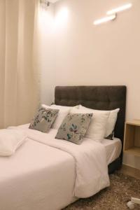 Postel nebo postele na pokoji v ubytování Jolie appartement à Ifrane calme et spacieux