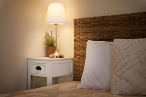 Voodi või voodid majutusasutuse La Terra dei Mari Room & Relax toas