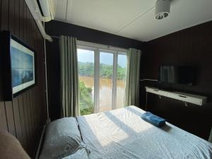 Postel nebo postele na pokoji v ubytování Jung Ja Hut