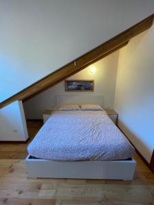 Postel nebo postele na pokoji v ubytování Nest in Alagna
