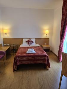 Postel nebo postele na pokoji v ubytování Hotel Marco Polo Airport hotel