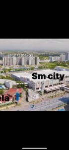 a picture of a city with the words sun city at Iloilo Condo Sm City Style Residences in Iloilo City