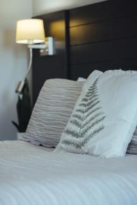 Posteľ alebo postele v izbe v ubytovaní Motel le Point de Vue