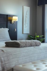 Posteľ alebo postele v izbe v ubytovaní Motel le Point de Vue