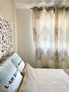 Giường trong phòng chung tại Séjour en Camargue