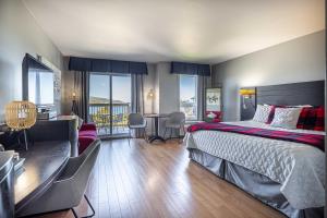 Posteľ alebo postele v izbe v ubytovaní Motel le Point de Vue