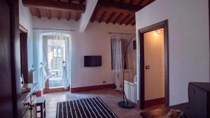 Televízia a/alebo spoločenská miestnosť v ubytovaní I Salici Agriturismo