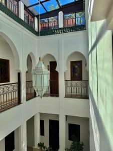 a view from the ceiling of a building with a light fixture at Riad Mandana & Spa in Marrakech