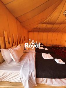 Postel nebo postele na pokoji v ubytování Royal Sands Camp