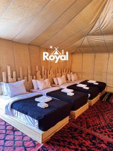 Postel nebo postele na pokoji v ubytování Royal Sands Camp