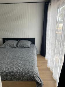Postel nebo postele na pokoji v ubytování Le Chalet d'Amélia