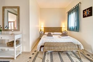 Postel nebo postele na pokoji v ubytování La Terra dei Mari Room & Relax