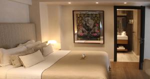 Кровать или кровати в номере Villa Cosy, hotel & spa