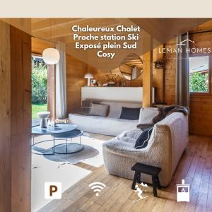 a living room with a couch and a table at Chalet Ilca in Thollon
