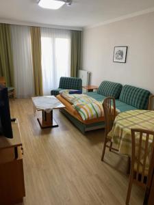 Posezení v ubytování Cara Apartments
