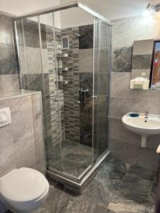 Koupelna v ubytování Hotel Pangea