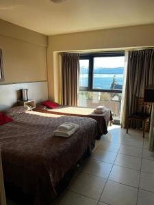 Postel nebo postele na pokoji v ubytování Hotel Internacional + 22 fotografií