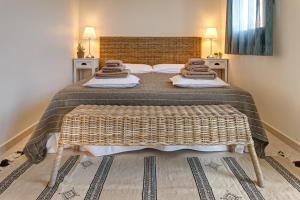 Voodi või voodid majutusasutuse La Terra dei Mari Room & Relax toas