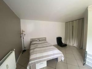 เตียงในห้องที่ T2 Compiegne