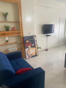 TV a/nebo společenská místnost v ubytování Appartement F2 Cosy Dakar Plateau