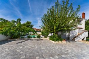 Afbeelding uit fotogalerij van Apartman sa bazenom u Ninu A1 in Nin