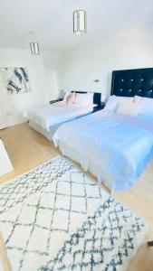 Postel nebo postele na pokoji v ubytování Sonas House + 29 fotografií