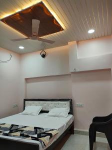 Letto o letti in una camera di Shri Mahaveer Residency