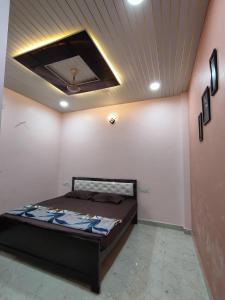 Letto o letti in una camera di Shri Mahaveer Residency