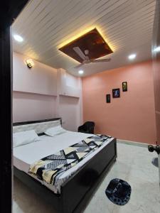Letto o letti in una camera di Shri Mahaveer Residency