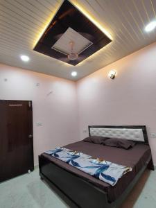 Letto o letti in una camera di Shri Mahaveer Residency