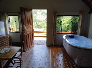 Φωτογραφία από το άλμπουμ του Chalé Portal Lazer Propriedade Inteira σε Gonçalves +55 φωτογραφίες