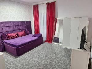 TV a/nebo společenská místnost v ubytování Lust Hostel