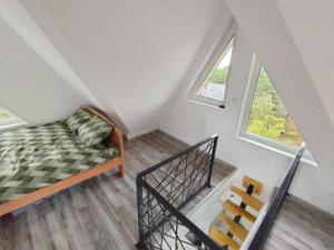 Tempat tidur dalam kamar di Djina 3 Divcibare